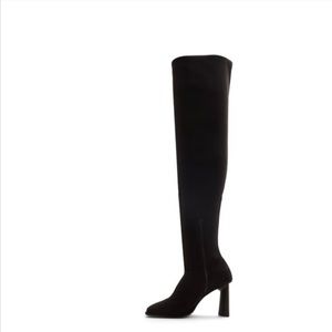 Never worn over the knee boots. Size 41